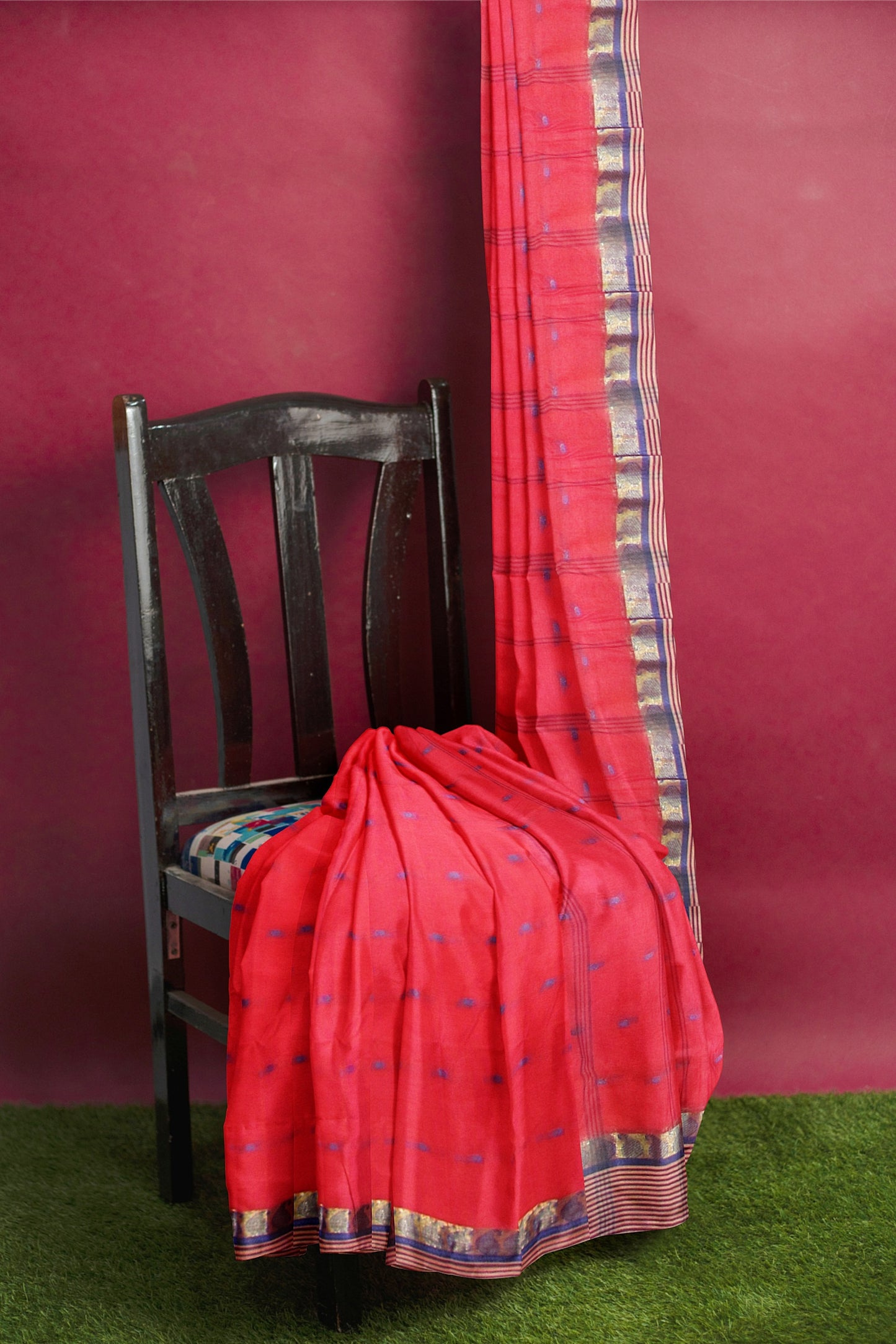 A blue and pink tant saree