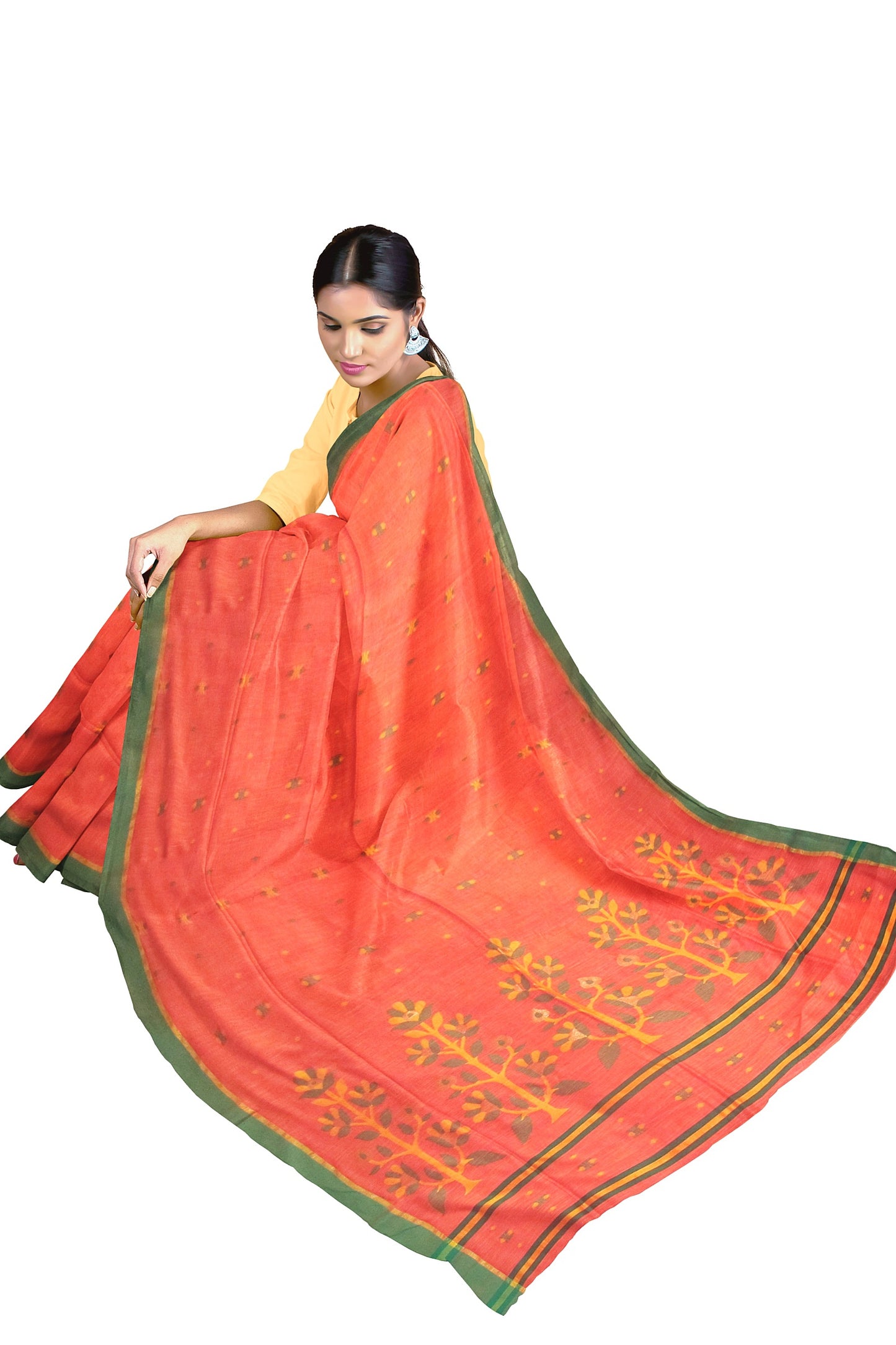 A fine peach and orange colored saree on a cotton base