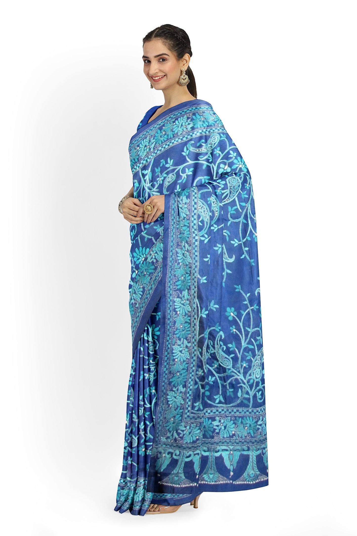 A blue and green embroidered silk saree