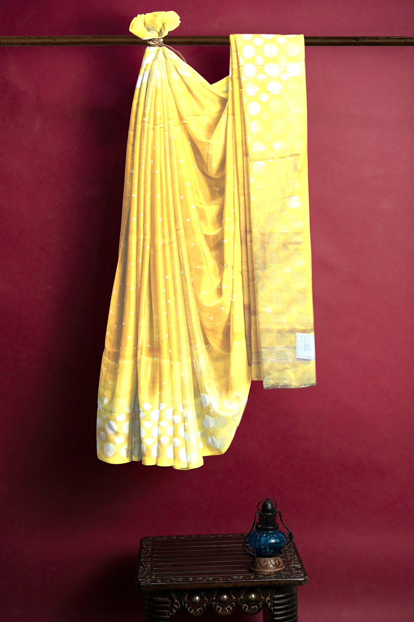 A handloom saree on a yellow base