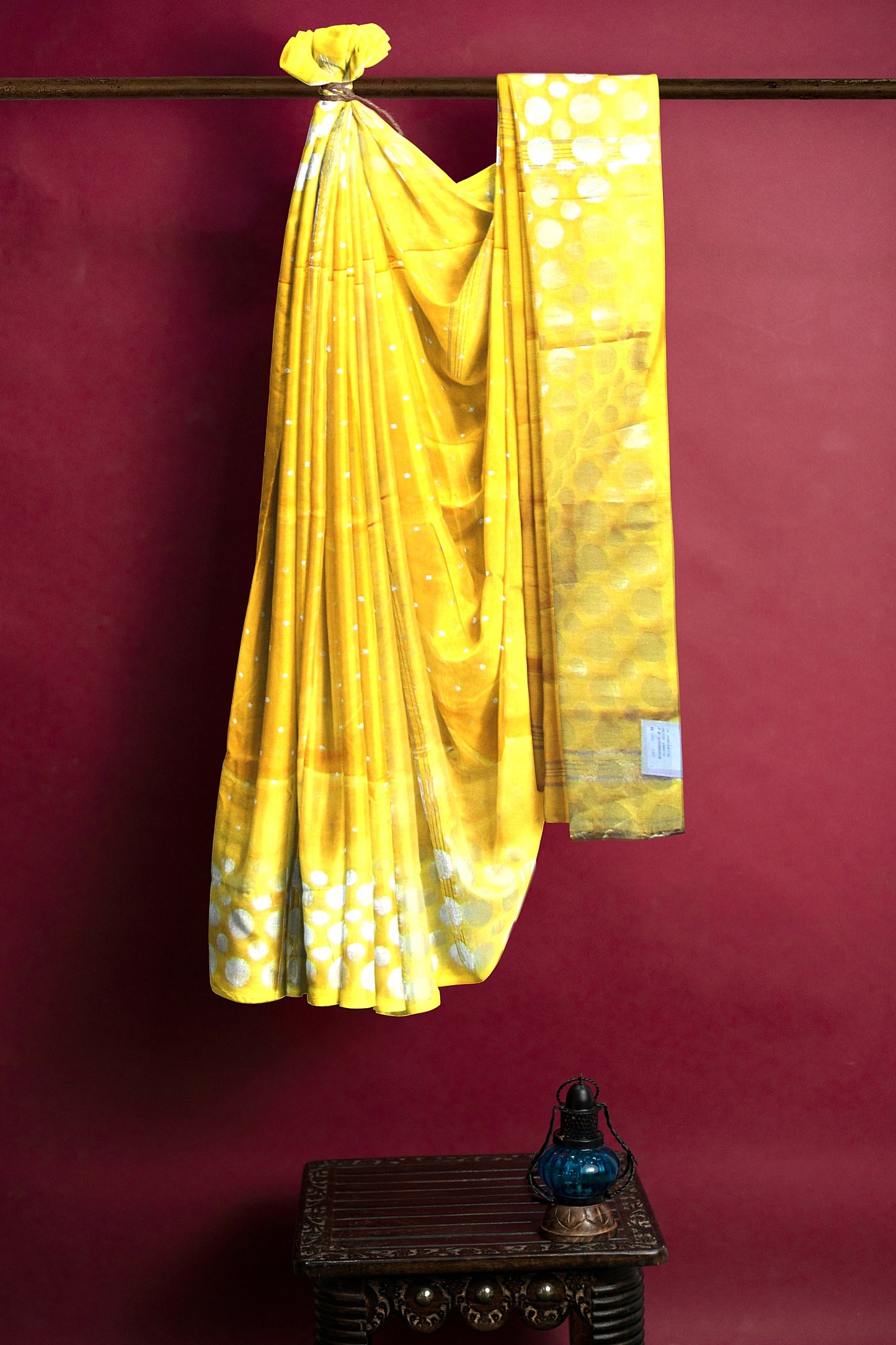 A handloom saree on a yellow base