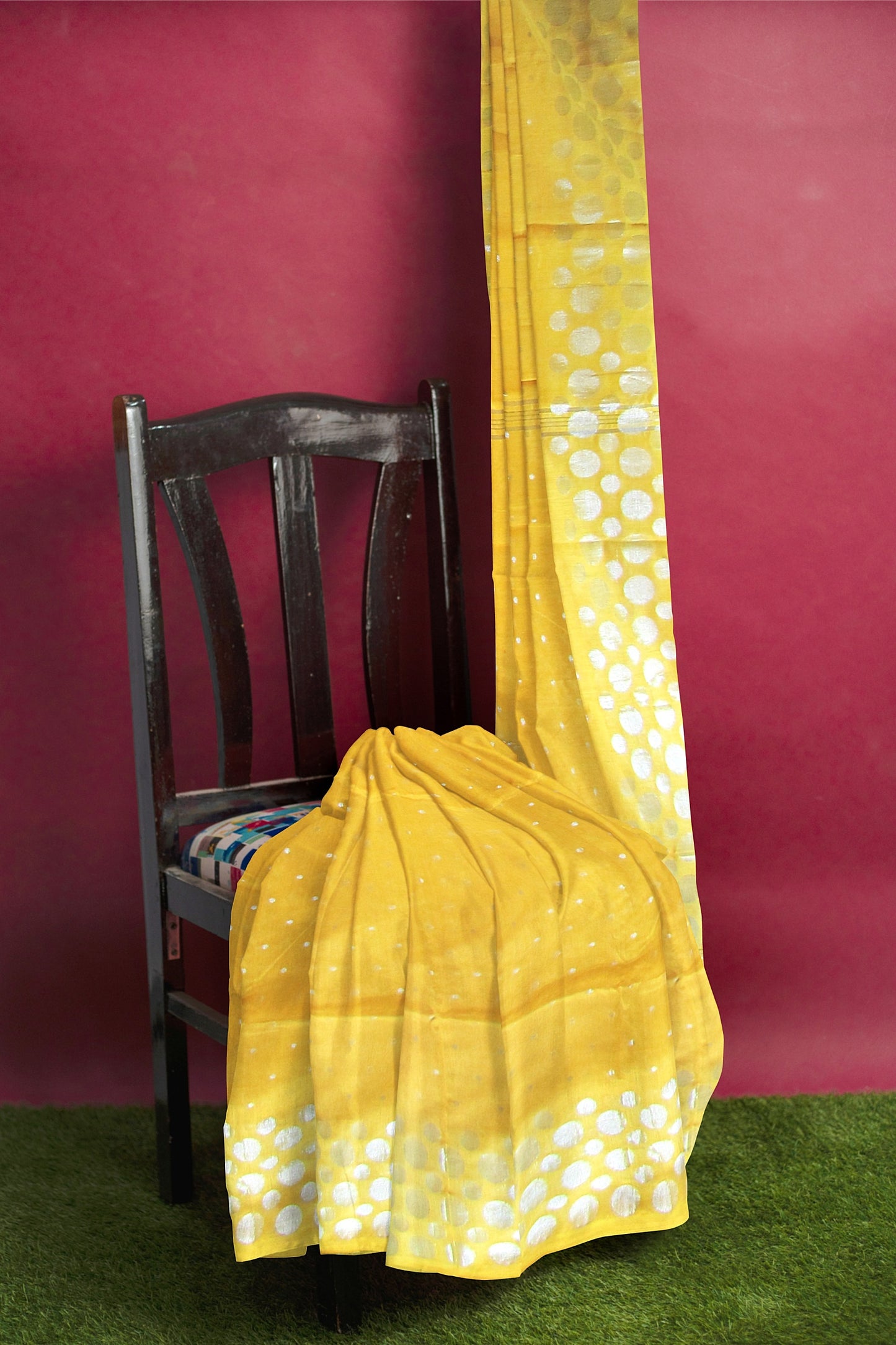 A handloom saree on a yellow base