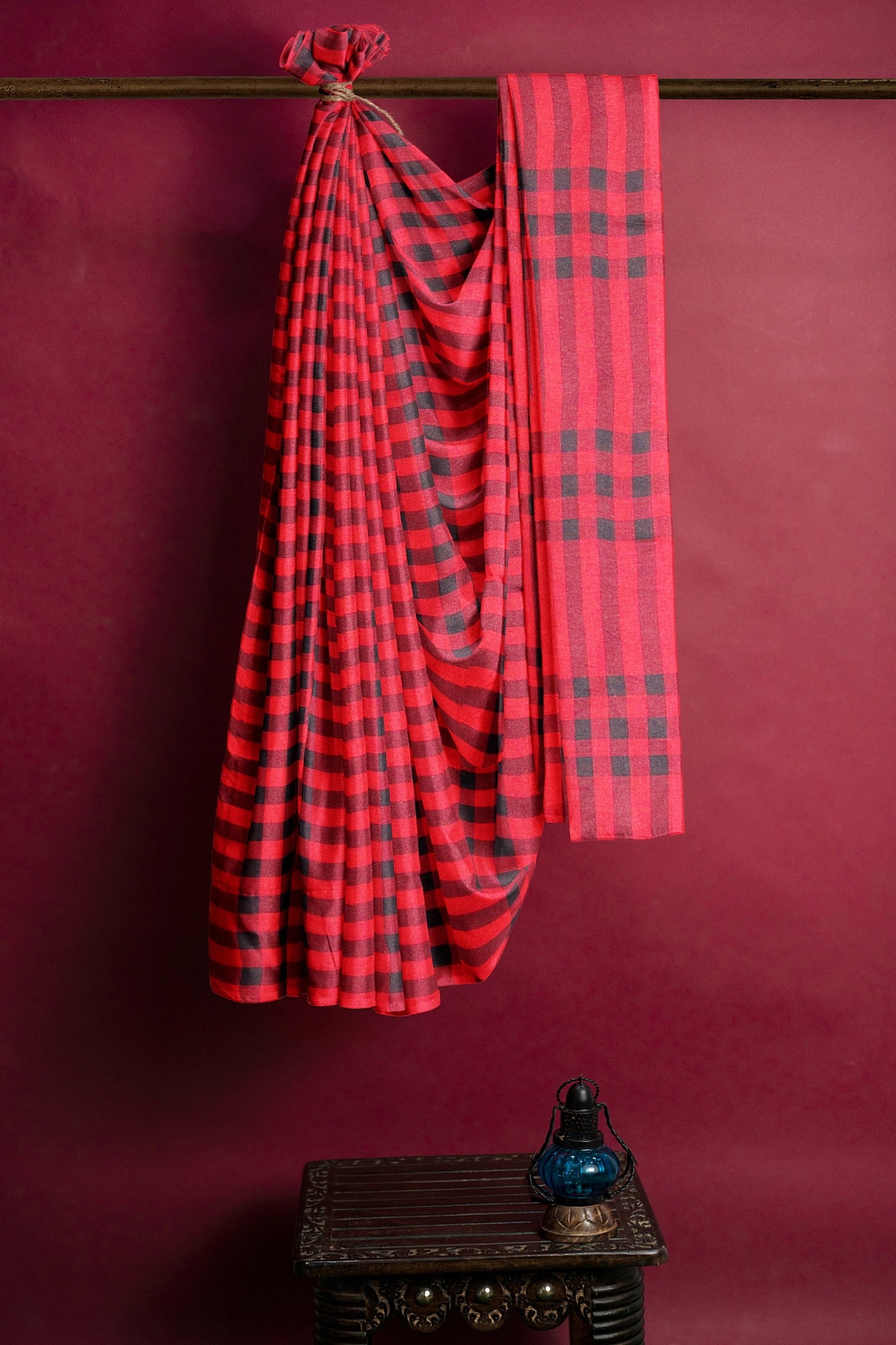 A red and black stripe handloom saree